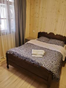 Postel nebo postele na pokoji v ubytování Agro Guest House Tsiskari in Machakhela