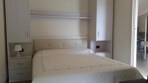 A bed or beds in a room at Green Park Residence