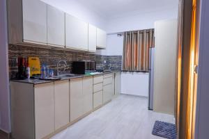 Η κουζίνα ή μικρή κουζίνα στο Aldora resident Hurghada