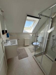 Kúpeľňa v ubytovaní Apartment Gyenesdias 19