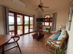 a living room with a couch and a table at Grand Plaza in San Juan del Sur