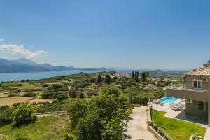a villa with a view of the lake at Arsinoe Villa in Kouvaláta