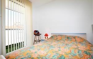 Posteľ alebo postele v izbe v ubytovaní Cozy Apartment In Canet En Roussillon