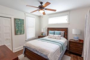 a bedroom with a bed and a ceiling fan at The Spring Peeper - 28 Hollow in Cherry Valley +77 photos