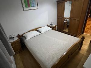 Postel nebo postele na pokoji v ubytování Apartman Mia