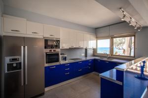 Kuchyň nebo kuchyňský kout v ubytování Seaside Villa Margarita