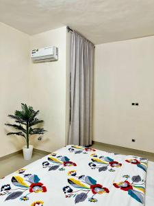 Postel nebo postele na pokoji v ubytování Cotonou Private Stay