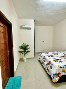 Postel nebo postele na pokoji v ubytování Cotonou Private Stay
