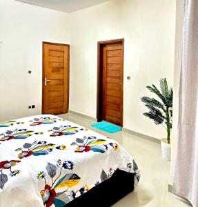 Postel nebo postele na pokoji v ubytování Cotonou Private Stay