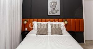 Iconyc Charlie Ibirapuera Hotel客房内的一张或多张床位
