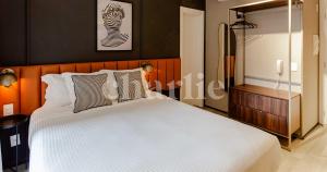 Iconyc Charlie Ibirapuera Hotel客房内的一张或多张床位