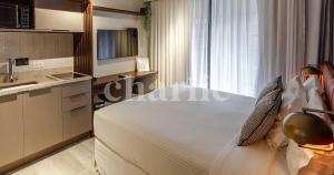 Iconyc Charlie Ibirapuera Hotel客房内的一张或多张床位