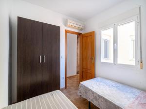 Postel nebo postele na pokoji v ubytování Apartment near the beach with sea views