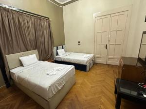 Postel nebo postele na pokoji v ubytování Bab el khair Hostel