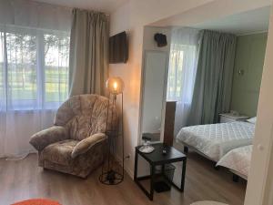 Uma cama ou camas num quarto em Valgemaja Majutus