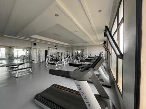a gym with a treadmill and other exercise equipment at Villa Aglou Center Near Mirlaft in Zaouia Sidi Ouaggag