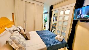 Posteľ alebo postele v izbe v ubytovaní Flat Apart hotel c/dois quartos em Moema SP