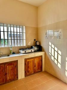 Kuchyň nebo kuchyňský kout v ubytování Cotonou Private Stay