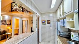 Kuchyňa alebo kuchynka v ubytovaní Flat Apart hotel c/dois quartos em Moema SP