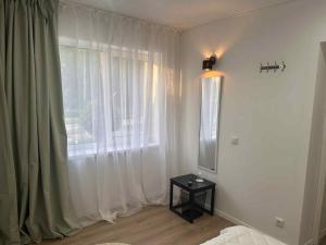Uma cama ou camas num quarto em Valgemaja Majutus