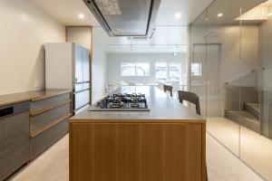 a kitchen with a counter with a stove in it at noma - Vacation STAY 24918v in Gifu +9 photos