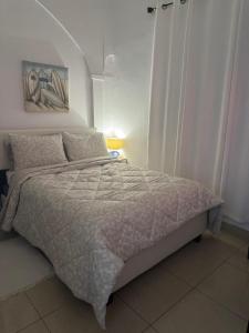 Postel nebo postele na pokoji v ubytování Oasis Inn