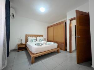 Letto o letti in una camera di OLAS DE SOL CARIBE playa LOS CORALES
