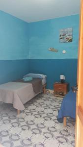 Postel nebo postele na pokoji v ubytování LA TERRAZZA SUL MARE camera doppia vicino aereoporto&mare SICILIAN SEA STYLE ROOM