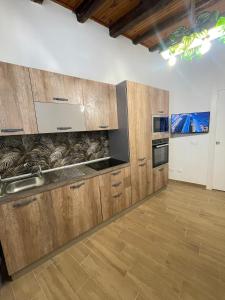 Η κουζίνα ή μικρή κουζίνα στο Casa di Anna +14 φωτογραφίες