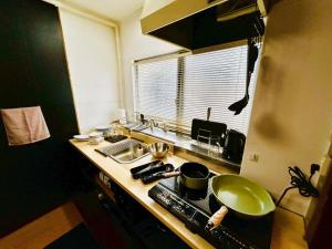 Η κουζίνα ή μικρή κουζίνα στο Shiki-Oriori - Vacation STAY 09649v