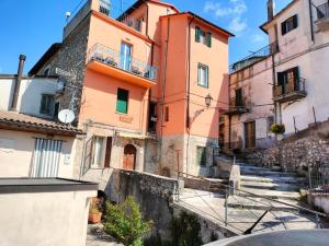 an alley in an old town with buildings at La finestra sulle colline in Torre Orsina