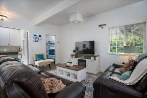 Μια τηλεόραση ή/και κέντρο ψυχαγωγίας στο Casa Malena Monthly Vacation Rental Only