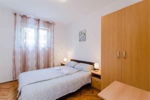 Posteľ alebo postele v izbe v ubytovaní Apartment in Crikvenica 5267