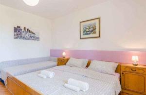 Posteľ alebo postele v izbe v ubytovaní Apartment in Crikvenica 5267