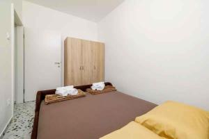 Posteľ alebo postele v izbe v ubytovaní Apartment in Novi Vinodolski 15435