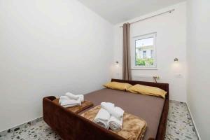 Posteľ alebo postele v izbe v ubytovaní Apartment in Novi Vinodolski 15435