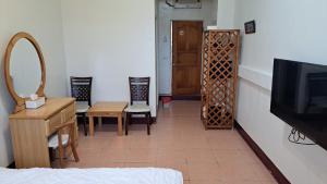 Μια τηλεόραση ή/και κέντρο ψυχαγωγίας στο Green Forest Homestay