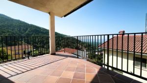 a balcony with a view of a mountain at Torreón El Guindal - Sierra de Gredos in Mijares