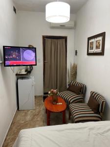 TV a/nebo společenská místnost v ubytování Casita de Norma + 2 fotografie