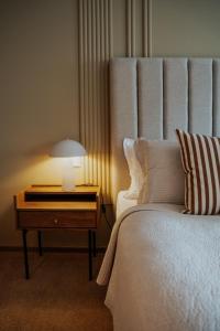 Postel nebo postele na pokoji v ubytování Hotel Vest Mar