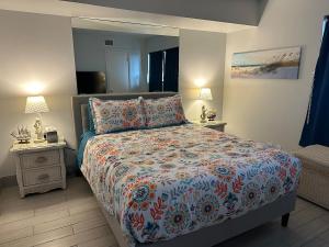 Ένα ή περισσότερα κρεβάτια σε δωμάτιο στο Panoramic Ocean View Condo +18 φωτογραφίες
