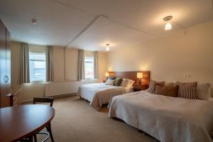 Postel nebo postele na pokoji v ubytování Hotel Vest Mar