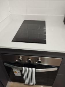 A cozinha ou kitchenette de Open Suite 3