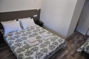 Postel nebo postele na pokoji v ubytování Villa Elena