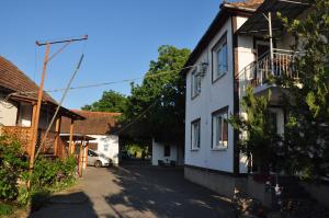 an alleyway between two buildings in a village at Villa Elena in Yanoshi