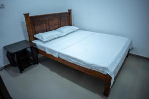 Postel nebo postele na pokoji v ubytování Backpackers GuestHouse Trincomalee
