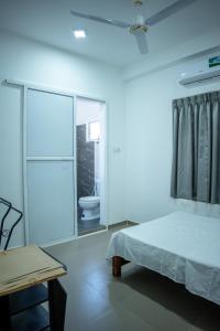 Postel nebo postele na pokoji v ubytování Backpackers GuestHouse Trincomalee