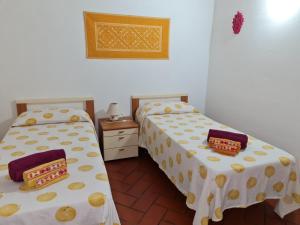 Postel nebo postele na pokoji v ubytování La Casa di Tella - Portopaglia free wifi - free parking
