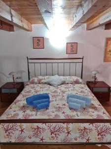 Postel nebo postele na pokoji v ubytování La Casa di Tella - Portopaglia free wifi - free parking