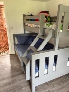 Tempat tidur dalam kamar di Siochain Agus Ciuin Teach